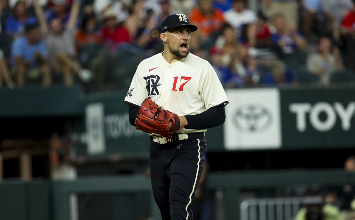 JTexas Rangers starting pitcher Nathan Eovaldi reacts after the seventh inning against the Houston Astros at Globe Life Field.